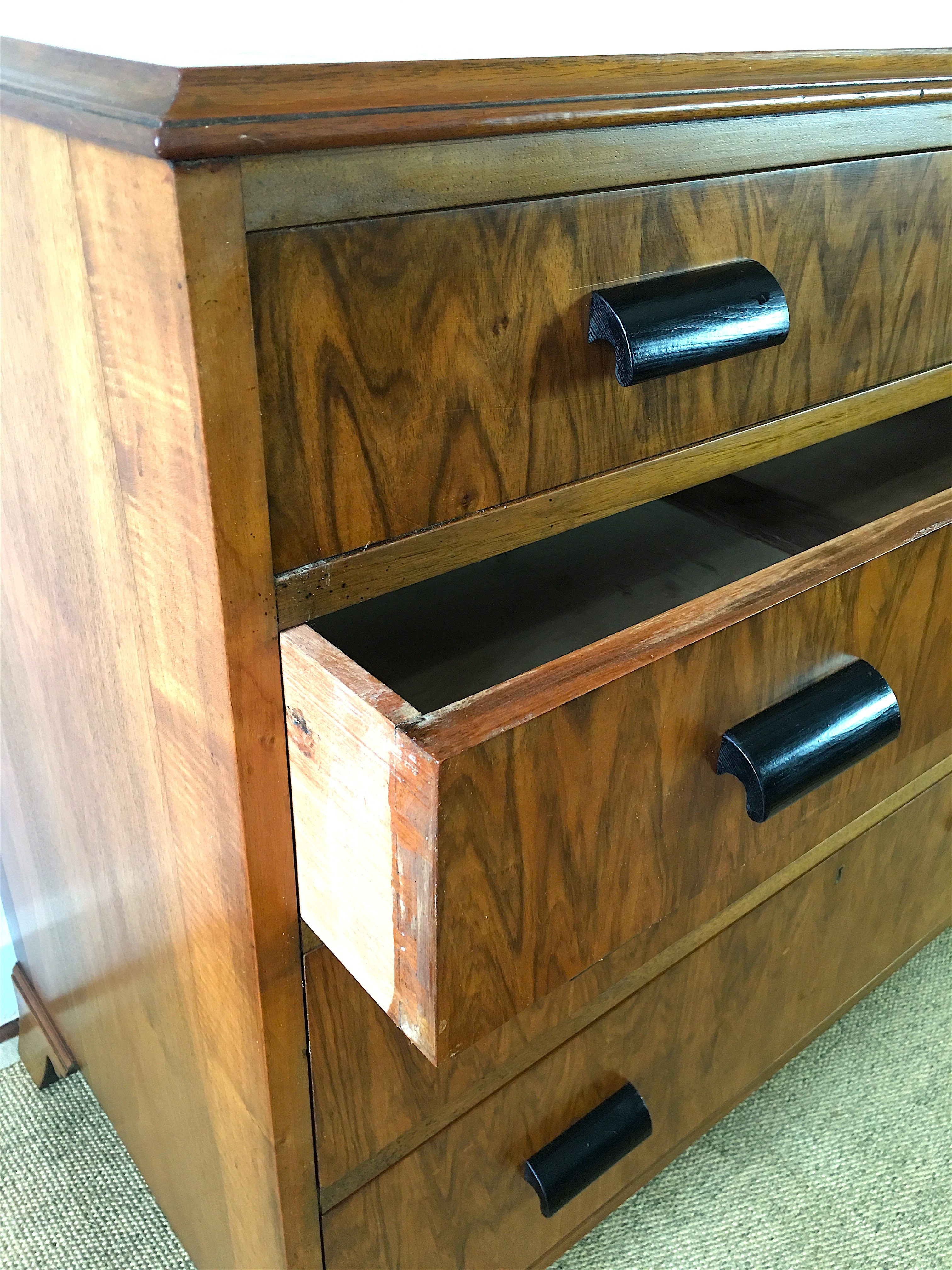 An Art Deco style figured walnut chest of four drawers, width 92cm, depth 50cm, height 83cm